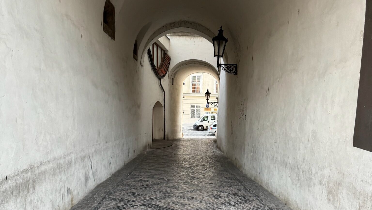Corridor in white stucco from Old Town in Prague, CZ